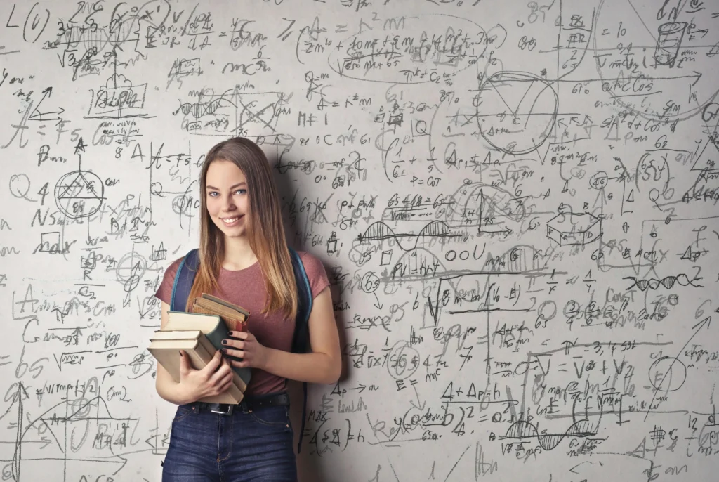 girl in front of a blackboard